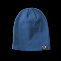 a close up product photo of the HIMALI Backcountry Beanie in colorway Blue Mineral