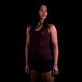 fit photo for the womens pursuit tech tank featuring quick dry materials in colorway upstream