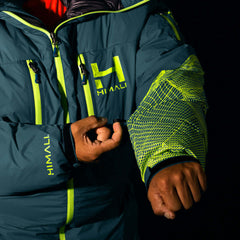 a fit photo of HIMALI cofounder Tendi Sherpa wearing the HIMALI 8000m down suit