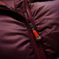 a close up detail photo of the altitude down parka's YKK zippers with custom HIMALI zipper pullers