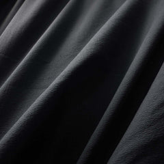 a closeup photo of the toray high streth & breathable fabric used on the ascent stretch hoodie