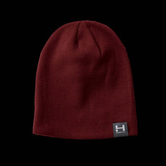a close up product photo of the HIMALI Backcountry Beanie in colorway Monk Red