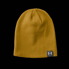a close up product photo of the HIMALI Backcountry Beanie in colorway Mustard
