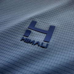 a close up fit photo of the HIMALI logo on the eclipse sun hoodie