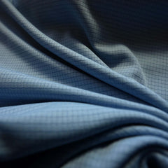 a close up phot of the breathable UV protection fabric on the eclipse sun hoodie