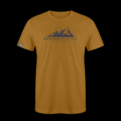a product photo of a mustard tech tee with a print of the flaitrons in boulder colorado