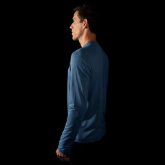 detailed fit photo of the sleeve for the mens pursuit long sleeve tech tee featuring quick dry materials