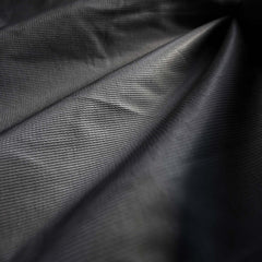 A closeup photo of the grey interior fabric of the Monsoon Hardshell 20K/20K waterproof breathable membrane