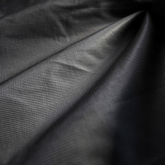 A closeup photo of the grey interior fabric of the Monsoon Hardshell 20K/20K waterproof breathable membrane