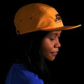 Woman wearing the Olympus Mons Boulder 5 Panel Hat made with premium materials