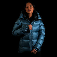 A fit photo of a person wearing the altitude down jacket as seen from the front