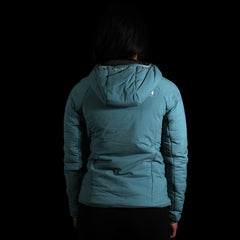 a fit photo of a person wearing the womens ascent stretch hoodie with 100g primaloft gold insulation