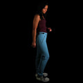 A fit photo (side view) of a woman wearing the softshell, 4way stretch Guide Flex Pants in Spring Blue