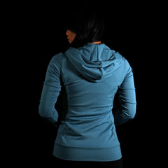 The back view of a model wearing the Women's Momentum Hoodie with odor control Polartec Fabric