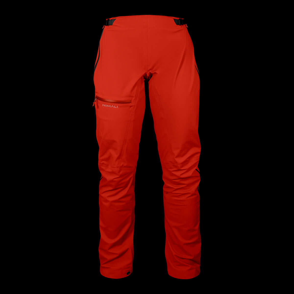 A product photo of the Women's Monsoon Hardshell 4-Season Waterproof pants in the color Lava Red made of a 20K/20K Waterproof Breathable Membrane