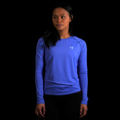 fit photo for the womens pursuit long sleeve tech tee featuring quick dry materials in colorway lupine