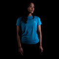 fit photo for the womens pursuit tech tee featuring quick dry materials