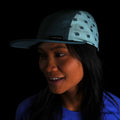 Woman wearing the Boulder 5 Panel Hat, Yak Print in color Evening Mist made with premium materials