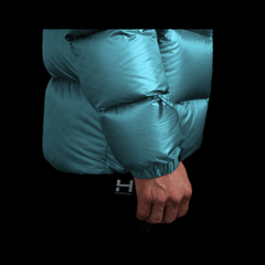 a close up photo of the customizable velcro wrist straps on the mens altitude down parka