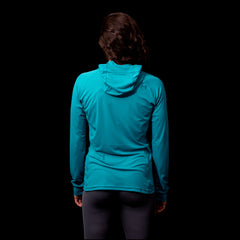 a fit photo of the back of the womens Eclipse Sun Hoodie with UV protection in colorway Electric Mint